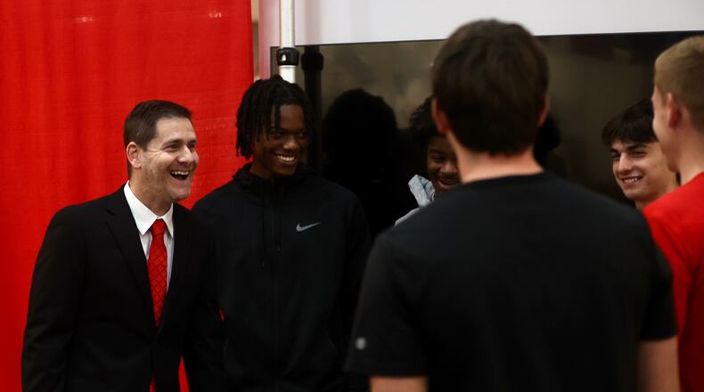 Darren Hertz talks to Wittenberg players at a press conference where he was introduced as Wittenberg men's basketball coach on Tuesday, Sept. 3, 2024, in Springfield. David Jablonski/Staff