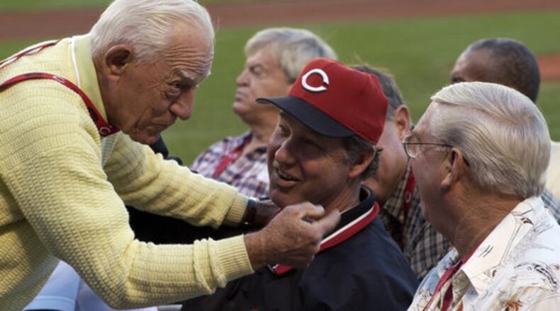 Sparky Anderson (left) chats with pitching coach Don Gullett and former player Tommy Helms during Joe Nuxhall Night at Great American Ballpark in 2004. FILE PHOTO