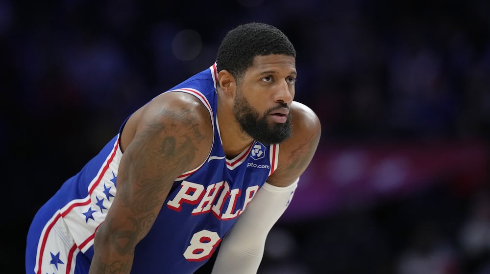 FILE - Philadelphia 76ers' Paul George looks on during a break in play during an NBA basketball game Thursday, Jan. 29, 2026, in Philadelphia. (AP Photo/Matt Slocum, File)