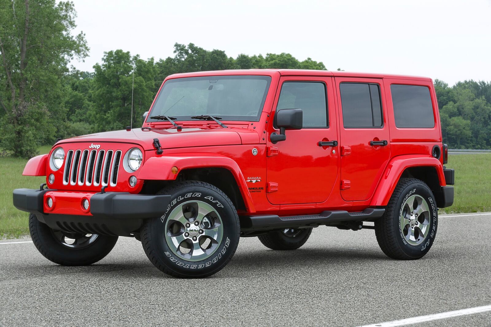 This photo provided by Jeep shows the 2016 Wrangler. A Wrangler has undeniable charm and is one of the few vehicles left that won't nickel-and-dime you with creature comforts you might not want. (Courtesy of Stellantis via AP)