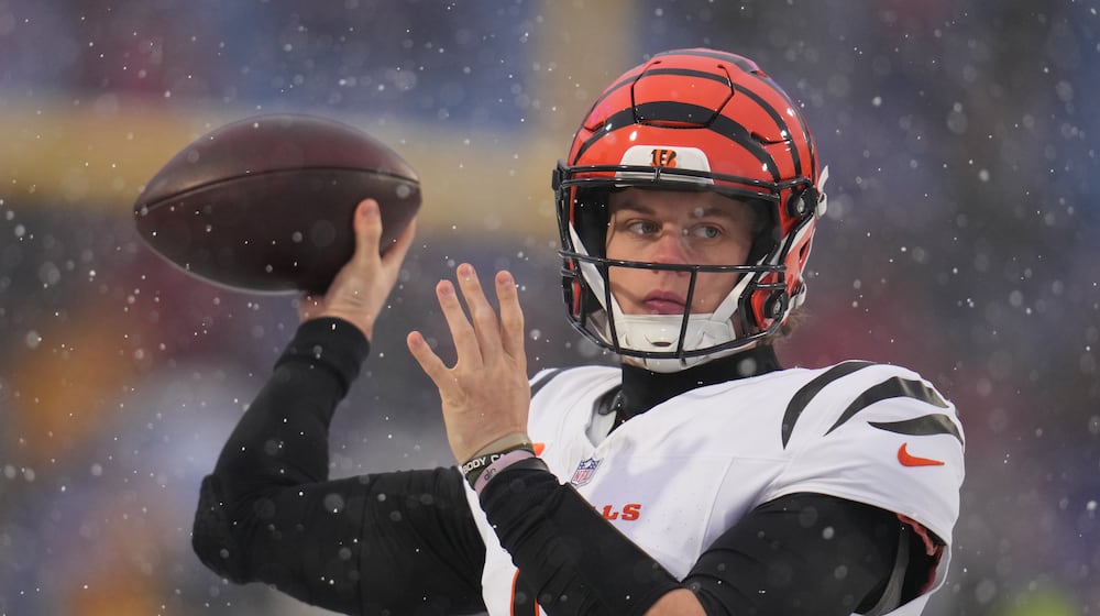 Cincinnati Bengals quarterback Joe Burrow throws a pass during warmups before an NFL football game against the Buffalo Bills, Sunday, Dec. 7, 2025, in Orchard Park, N.Y. (AP Photo/Gene J. Puskar)