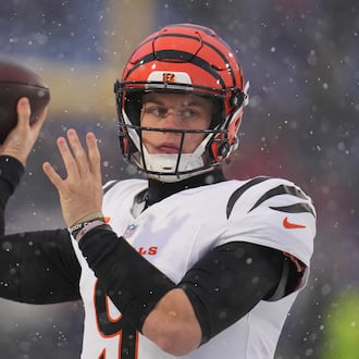 Cincinnati Bengals quarterback Joe Burrow throws a pass during warmups before an NFL football game against the Buffalo Bills, Sunday, Dec. 7, 2025, in Orchard Park, N.Y. (AP Photo/Gene J. Puskar)