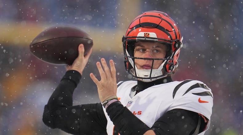 Cincinnati Bengals quarterback Joe Burrow throws a pass during warmups before an NFL football game against the Buffalo Bills, Sunday, Dec. 7, 2025, in Orchard Park, N.Y. (AP Photo/Gene J. Puskar)
