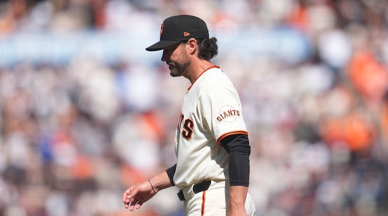 San Francisco Giants manager Tony Vitello walks to the dugout after making a pitching change during the sixth inning of a baseball game against the New York Yankees in San Francisco, Friday, March 27, 2026. (AP Photo/Jeff Chiu)