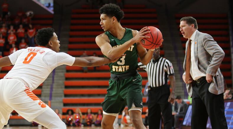 Clemson’s Clyde Trapp (2) guards Wright State’s Mark Hughes (3) as Clemson coach Brad Brownell watches during Tuesday night’s NIT game at Littlejohn Coliseum in Clemson, S.C. Clemson won 75-69. PHOTO COURTESY OF CLEMSON ATHLETICS