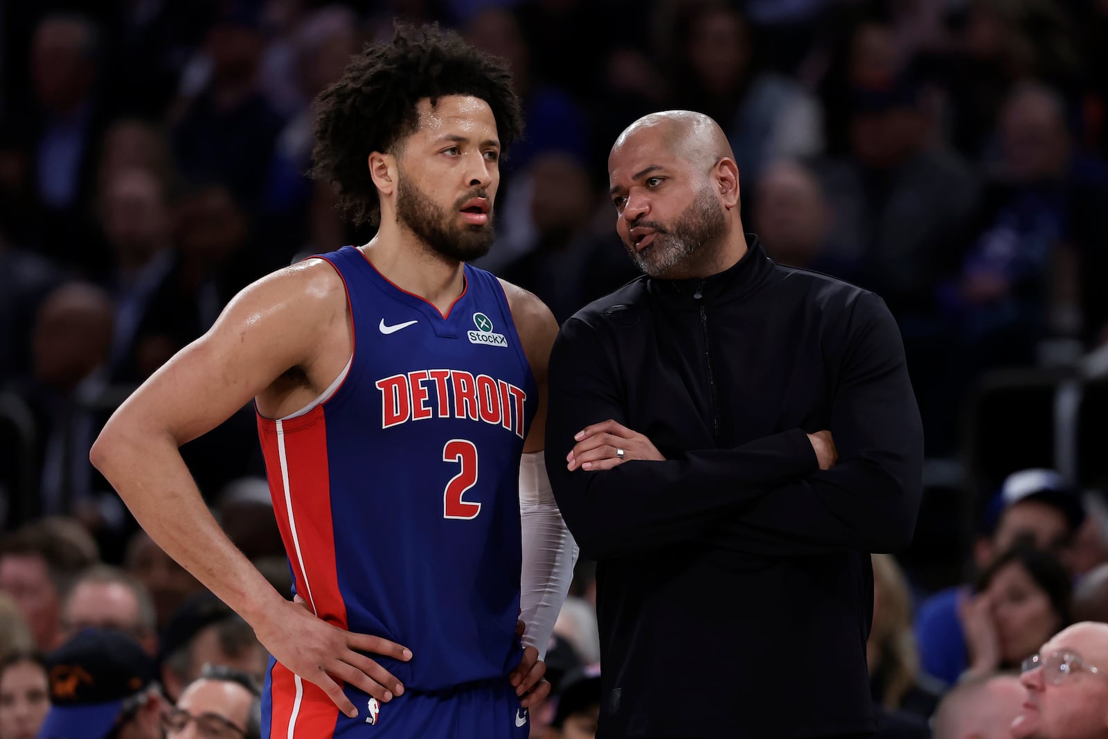 Detroit Pistons head coach J.B. Bickerstaff talks to Cade Cunningham (2) in the second half during Game 5 in an NBA basketball first-round playoff series against the New York Knicks, Tuesday, April 29, 2025, in New York. (AP Photo/Adam Hunger)