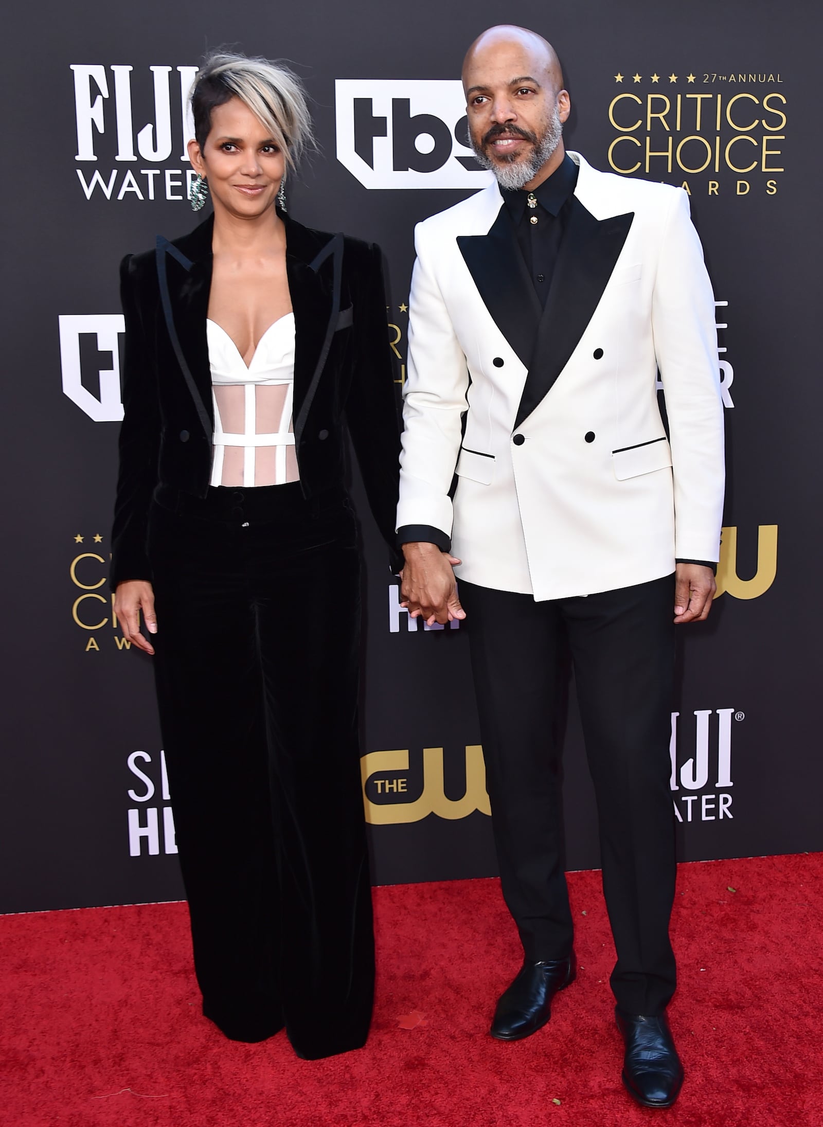Halle Berry, left, and Van Hunt arrive at the 27th annual Critics Choice Awards on Sunday, March 13, 2022, at the Fairmont Century Plaza Hotel in Los Angeles. (Photo by Jordan Strauss/Invision/AP)