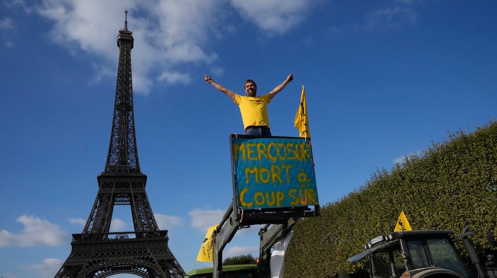 FILE - French farmers protest against the Mercosur trade alliance with South America countries, on Oct. 14, 2025 near the Eiffel Tower in Paris. (AP Photo/Michel Euler, File)