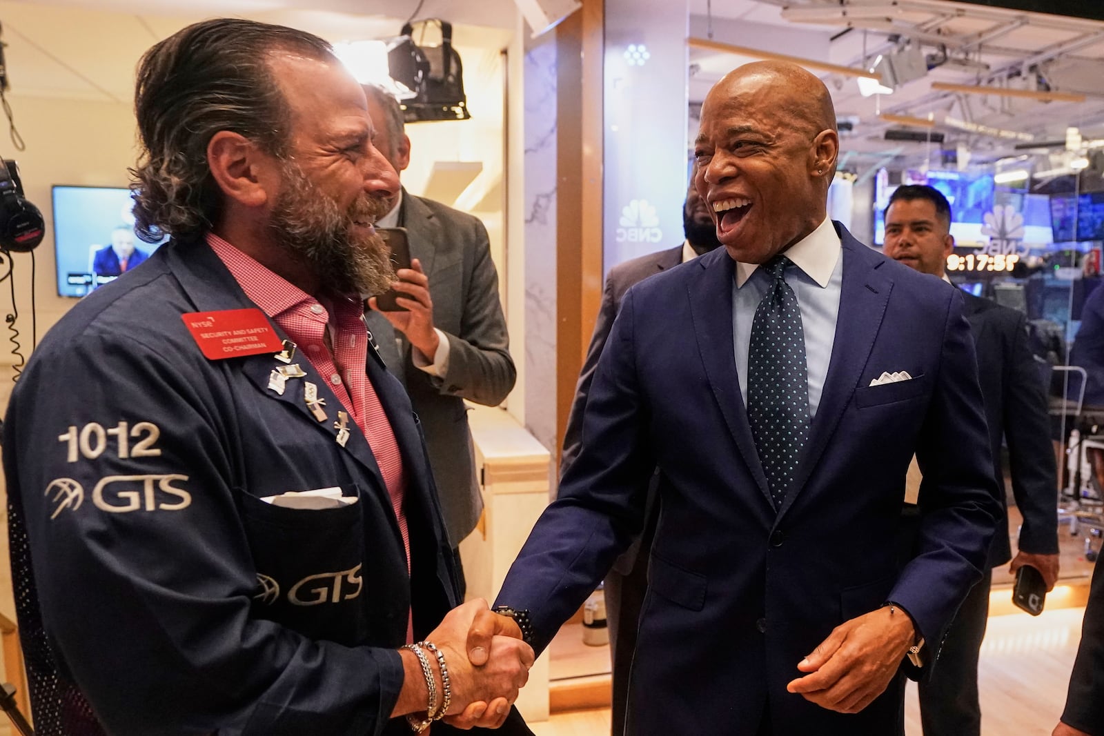 Trader Michael Pistillo, left, meets New York Mayor Eric Adams on the floor of the New York Stock Exchange after Adams was interviewed on CNBC, Friday, June 27, 2025. (AP Photo/Richard Drew)