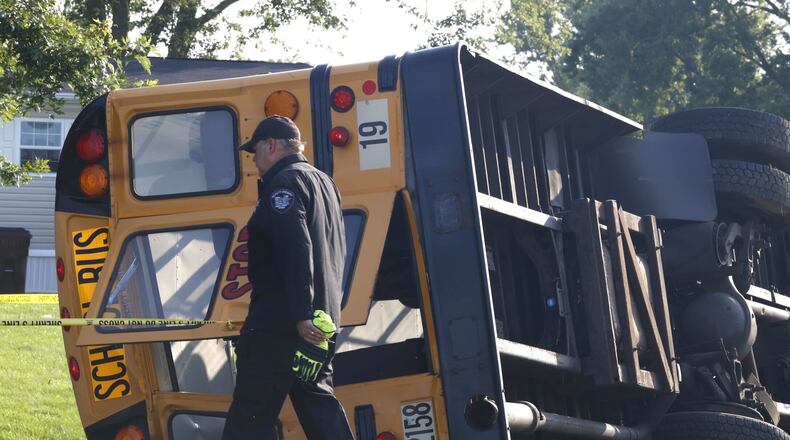 At least one person was killed after a Northwestern school bus was involved in a crash on Route 41 in German Twp. Tuesday, Aug. 22, 2023. BILL LACKEY/STAFF