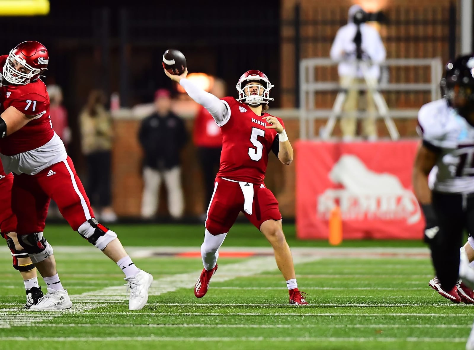 Brett Gabbert throws a pass during Miami University's game against Cincinnati last season at Yager Stadium. KYLE HENDRIX / CONTRIBUTED