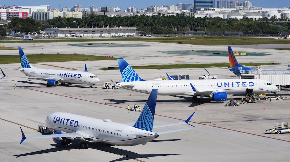 United Airlines aircraft move from the gate at Fort Lauderdale-Hollywood International Airport, Thursday, Nov. 13, 2025, in Fort Lauderdale, Fla. (AP Photo/Lynne Sladky)
