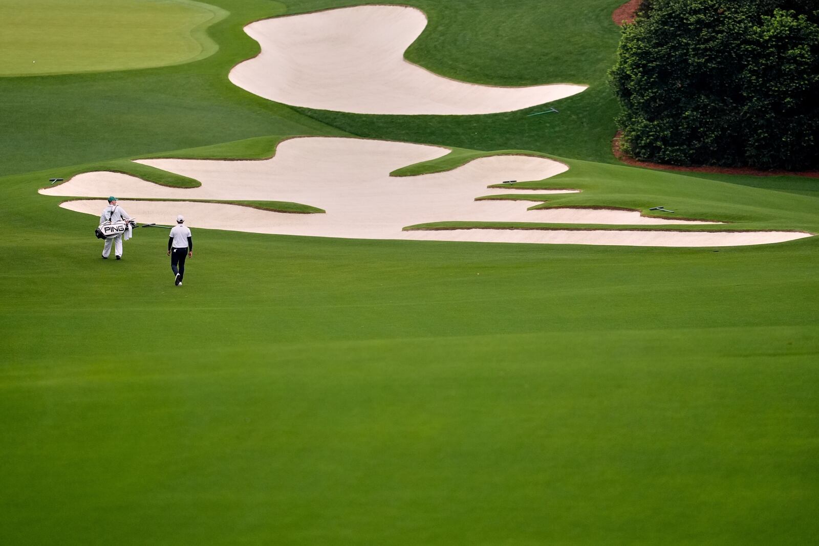 Matthieu Pavon, of France, walks up the 10th fairway during a practice round at the Masters golf tournament, Monday, April 7, 2025, in Augusta, Ga. (AP Photo/George Walker IV)