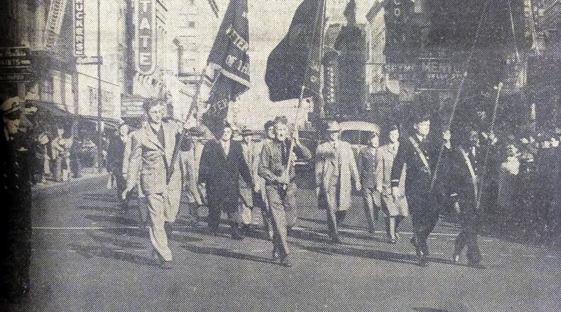 Historic celebration Veterans of World War I are shown marching north on Fountain Avenue in the Armistice Day (Veterans Day) parade, abbreviated to make it less demanding on older veterans. At extreme left is Roger Sharp, Clark County Veterans Service Officer, who acted as master of ceremonies. The color guards in the picture are American Legion and Veterans of Foreign Wars units. CLARK COUNTY HISTORICAL SOCIETY