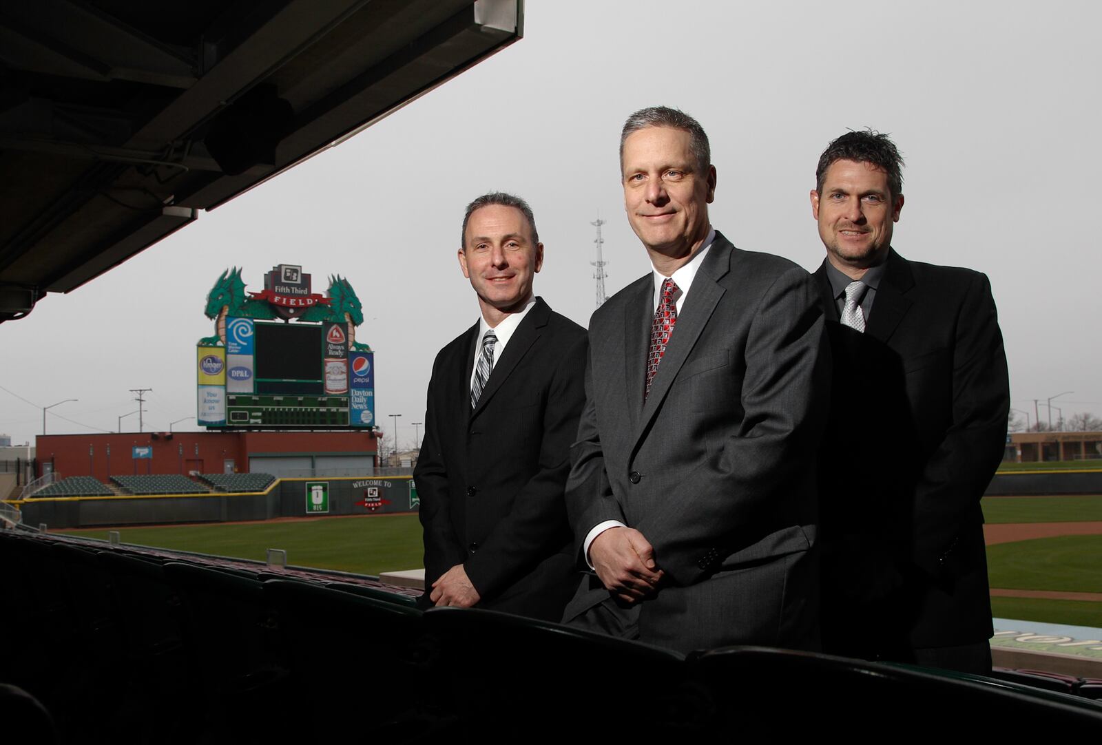 The Dayton Dragons (left to right) Eric Deutsch, executive vice president, Bob Murphy, president and Gary Mayse, executive vice president and general manager have been with the team since the beginning. STAFF PHOTO BY LISA POWELL