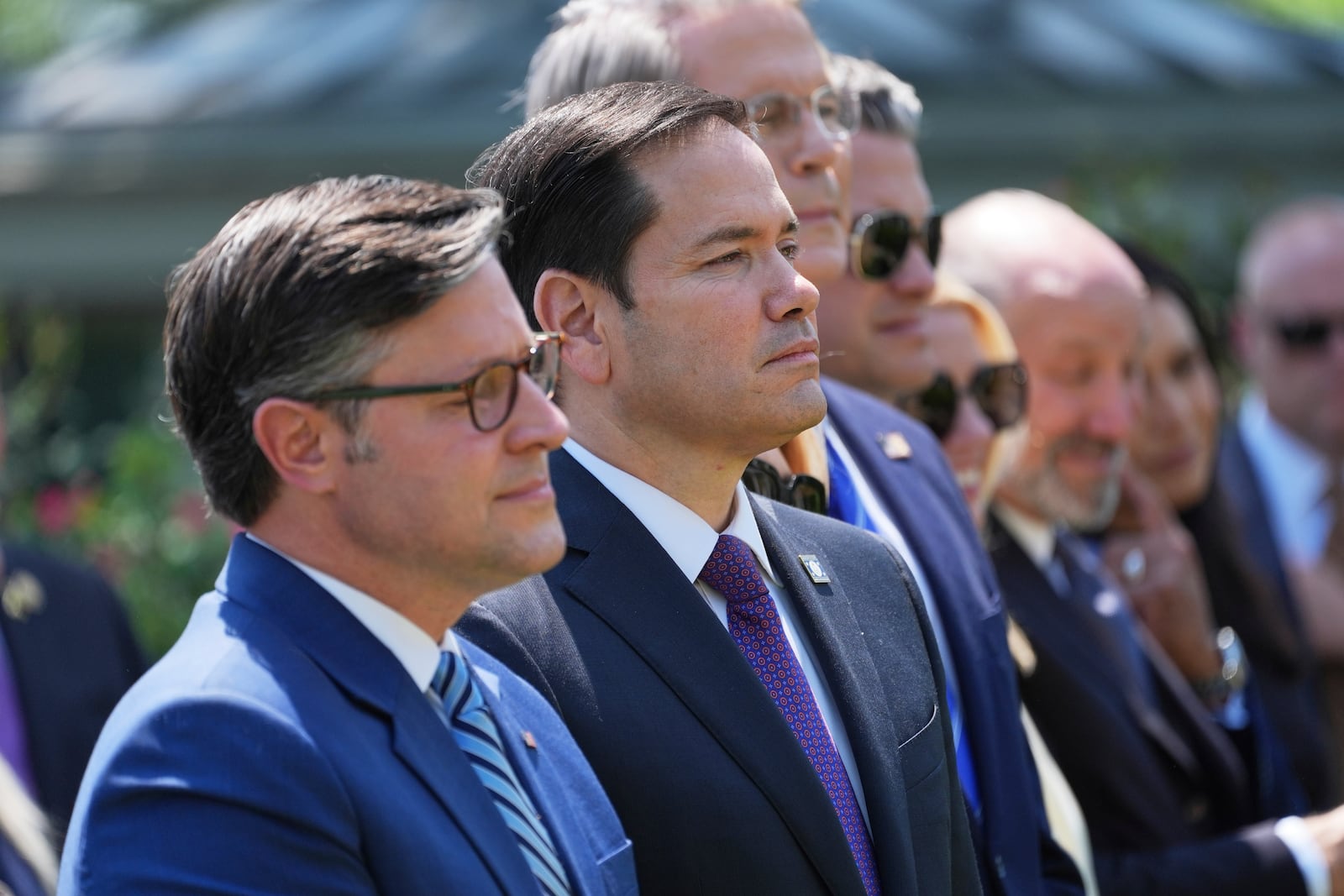 House Speaker Mike Johnson, R-La., from left, Secretary of State Marco Rubio, Treasury Secretary Scott Bessent, Defense Secretary Pete Hegseth, Attorney General Pam Bondi and Commerce Secretary Howard Lutnick listen as President Donald Trump speaks during a National Day of Prayer event in the Rose Garden of the White House, Thursday, May 1, 2025, in Washington. (AP Photo/Evan Vucci)