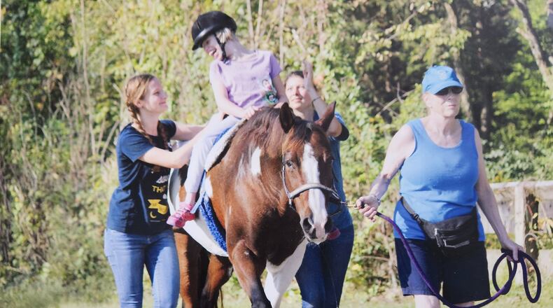 A student at The Riding Centre in Yellow Springs on “Honey Pepper.” Honey Pepper has been adopted by Springfield Rotary. Almost every teacher who wants to do therapeutic riding with their grant stipend uses The Riding Centre in Yellow Springs. Contributed