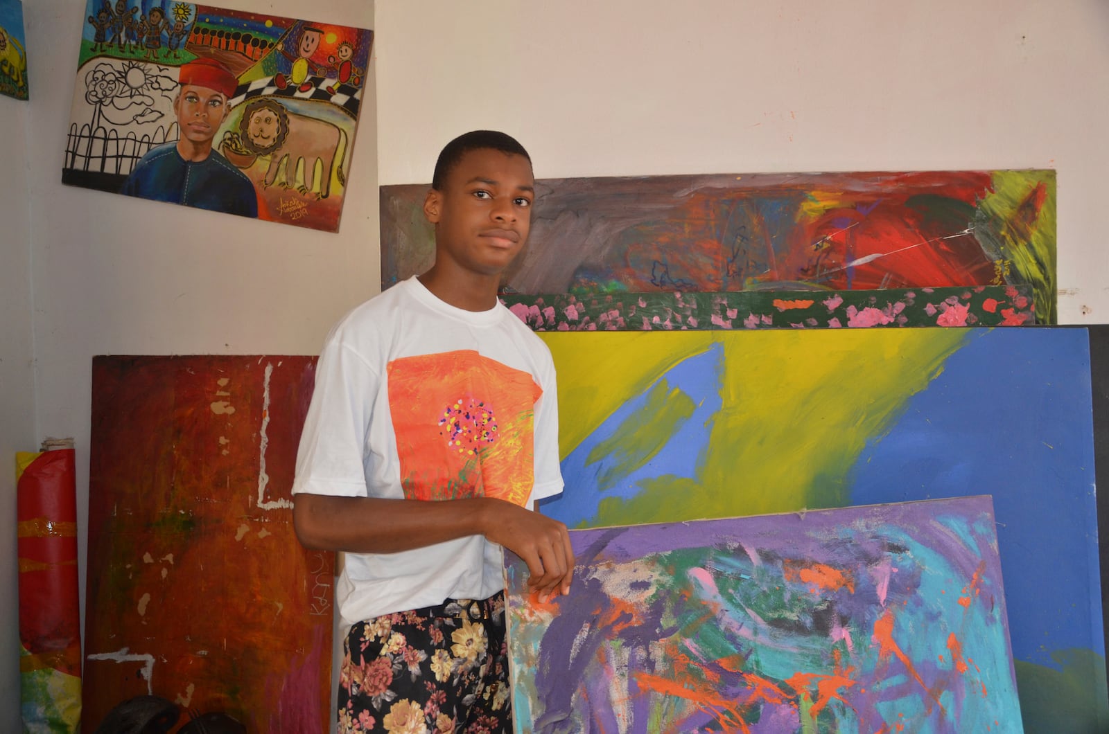 Kanyeyachukwu Tagbo Okeke, a 15 year-old autistic Nigerian, who set a Guinness World Record for the world's largest art canvas, is photograph during an interview in Abuja, Nigeria, Friday, April 18, 2025. (AP Photo/Olamikan Gbemiga)