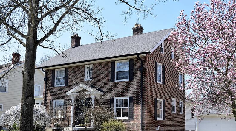 This 3-bedroom home offers a warm, traditional style with about 2,120 sq. ft. of living space. The home has a detached, 2- car garage and a sunroom. CONTRIBUTED PHOTO