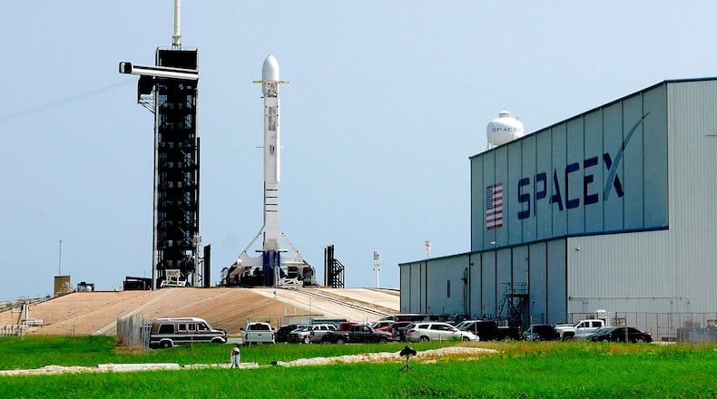 FILE - A Falcon 9 SpaceX rocket stands ready for launch at pad 39A at the Kennedy Space Center in Cape Canaveral, Fla., Friday, June 26, 2020. (AP Photo/John Raoux, file)