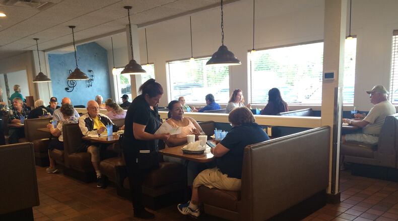 Customers dine at the Mel-O-Dee on its first day open after a tornado caused it to close for repairs. KATHERINE COLLINS/STAFF