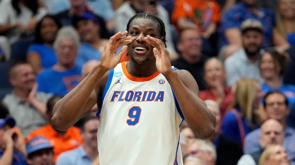 Florida center Rueben Chinyelu (9) celebrates during the second half in the first round of the NCAA college basketball tournament against Prairie View A M Friday, March 20, 2026, in Tampa, Fla. (AP Photo/Chris O'Meara)