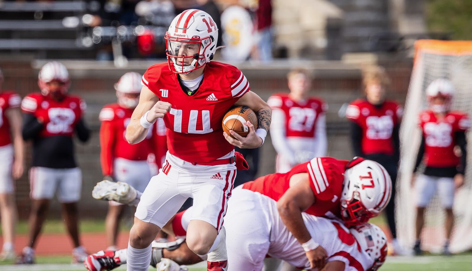 Wittenberg quarterback Jayden Miller runs with the ball during a 2024 game against Wabash at Edwards-Maurer Field in Springfield. Photo courtesy of Wittenberg