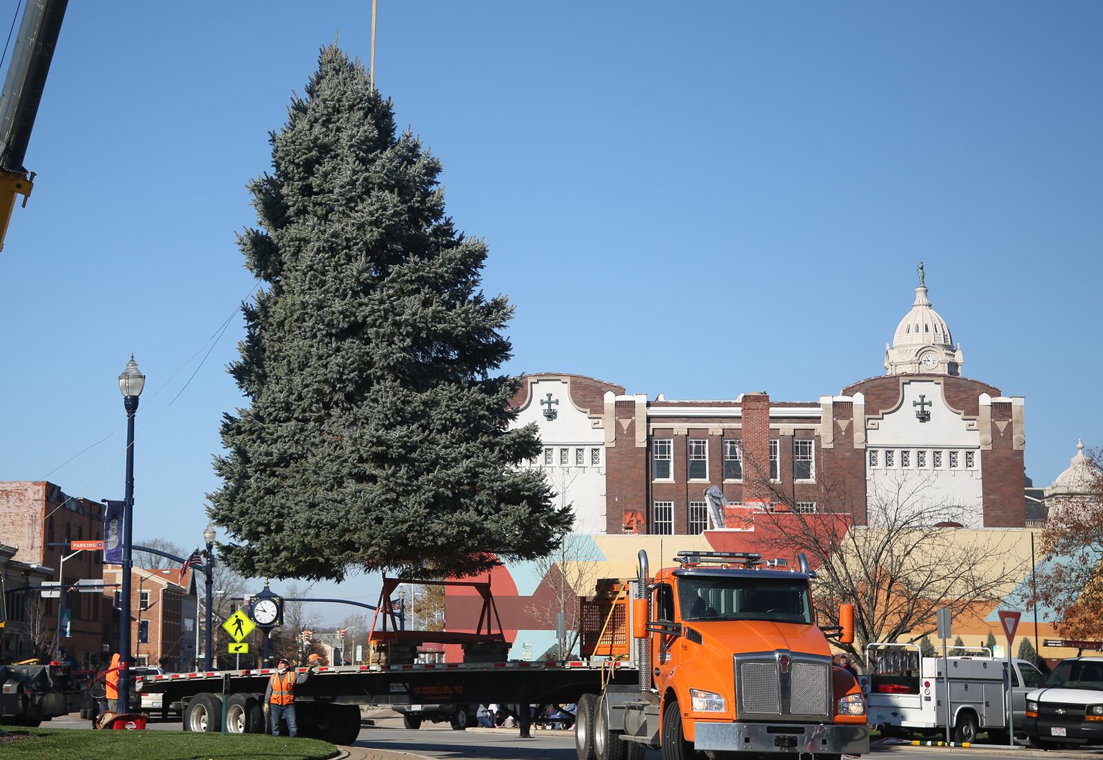 The Christmas tree for Troy's Public Square was delivered Thursday, Nov. 12. The city's Holiday Lighting 2020 event kicks off Friday, Nov. 27 at 6:30 p.m. There will be Christmas music, the arrival of Santa on a fire truck and the annual lighting of the tree and levee lights. Facial coverings and social distancing are encouraged and commemorative masks will be available. LISA POWELL / STAFF