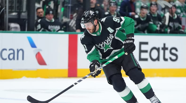 Dallas Stars center Tyler Seguin skates with the puck during the first period of an NHL hockey game against the Ottawa Senators, Sunday, Nov. 30, 2025, in Dallas. (AP Photo/LM Otero)