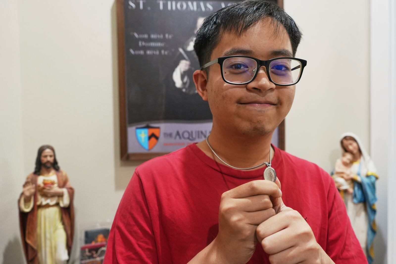 Princeton University alumnus Ace Acuna stands for a portrait at the Aquinas Institute, the university’s Catholic campus ministry, after a Mass at the school's chapel in Princeton, N.J., on Thursday, May 15, 2025. (AP Photo/Luis Andres Henao)