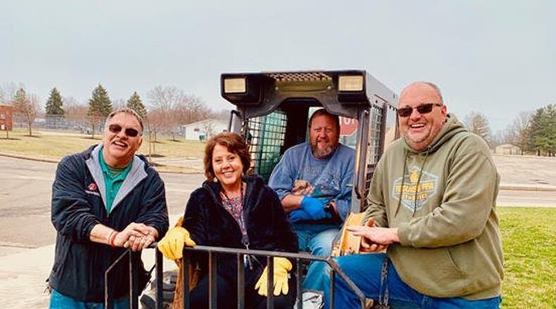 Staff members spent Thursday morning picking up eight skids of food from Second Harvest and delivering it to Tecumseh High School to be used with the Lunch Bus Program. CONTRIBUTED
