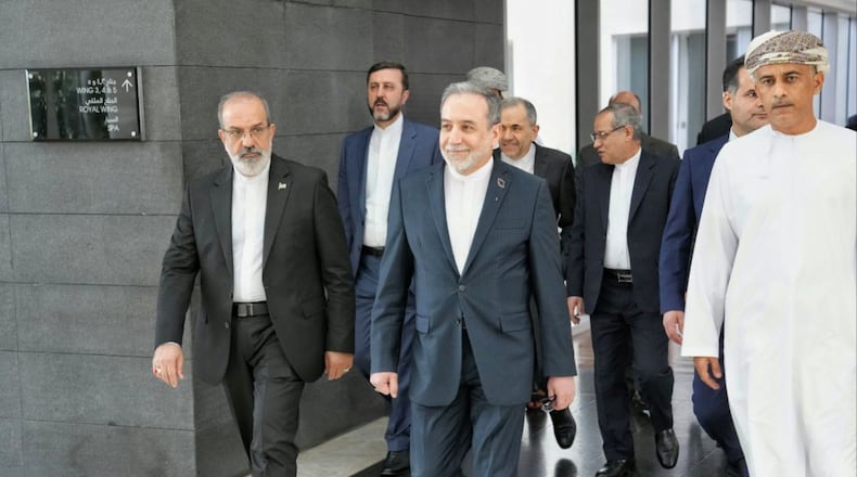 FILE - In this photo released by the Iranian Foreign Ministry, Iranian Foreign Minister Abbas Araghchi, center, heads to the venue for talks between Iran and the U.S., in Muscat, Oman, Friday, Feb. 6, 2026. (Iranian Foreign Ministry via AP, File)