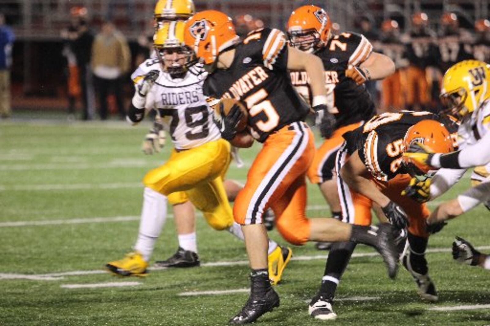 Coldwater quarterback Brody Hoying ran for 134 first-half yards and scored on an 84-yard romp in leading the Cavs to a 14-7 halftime lead over West Jefferson in a D-V state football semifinal at Piqua on Saturday, Nov. 30, 2013.