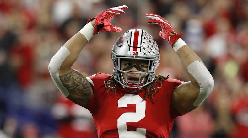 INDIANAPOLIS, INDIANA - DECEMBER 01: J.K. Dobbins #2 of the Ohio State Buckeyes celebrates after a play against the Northwestern Wildcats at Lucas Oil Stadium on December 01, 2018 in Indianapolis, Indiana. (Photo by Joe Robbins/Getty Images)