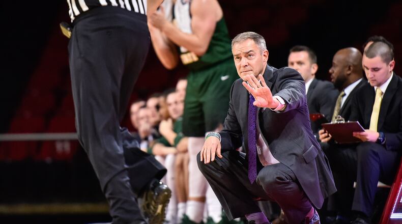 Wright State University head men’s basketball coach Scott Nagy kneels by the court during their game against Miami University Tuesday, Nov. 14, 2017, at Millett Hall in Oxford. NICK GRAHAM/STAFF