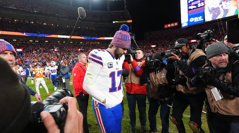 Buffalo Bills quarterback Josh Allen (17) leaves the field after an NFL divisional round playoff football game against the Denver Broncos, Saturday, Jan. 17, 2026, in Denver. (AP Photo/Jack Dempsey)