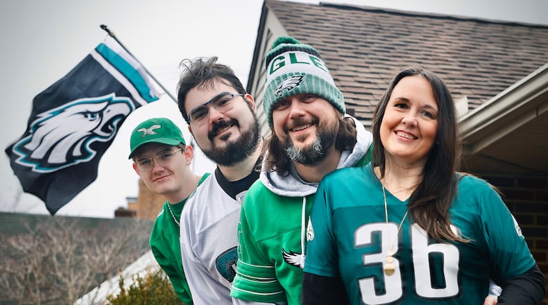 The Shober family of Kettering, from left, Aidan, Ethan, Matt and Betsy, are die-hard Philadelphia Eagles fans. MARSHALL GORBY/STAFF