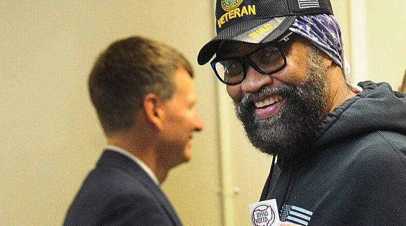 Brian Faggett Sr. shows off his "I voted" sticker Wednesday, Oct. 12, 2022, at the Montgomery County Board of Elections. Early voting started Wednesday in Ohio. Election officials expect a large turnout of early voters this year. MARSHALL GORBY\STAFF