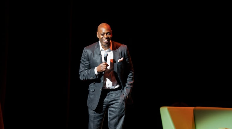 Dave Chappelle performs during a theater dedication ceremony honoring the comedian and actor, and to raise funds to support Duke Ellington School of the Arts in Washington, Monday, June. 20, 2022. (AP Photo/Gemunu Amarasinghe)
