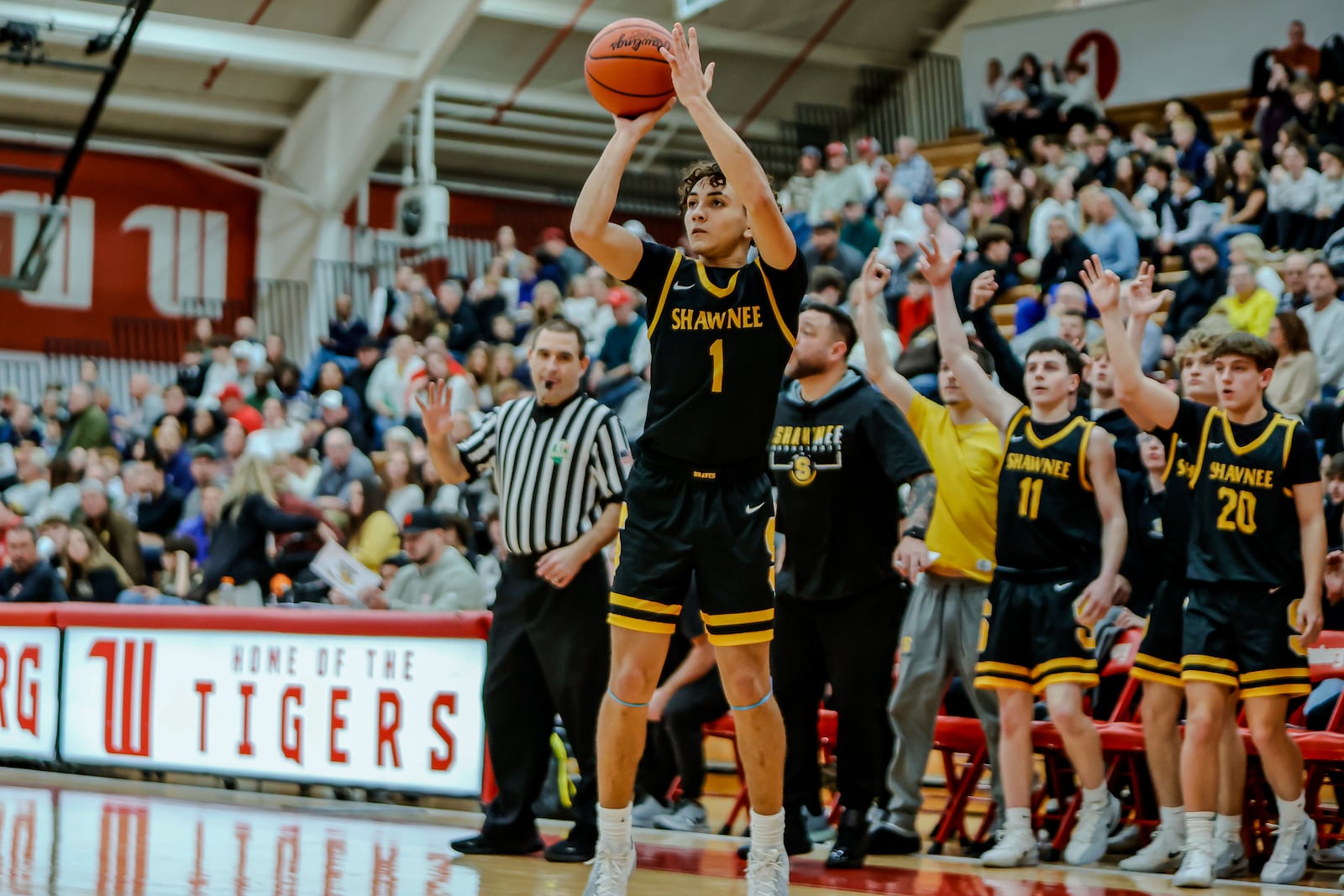 Shawnee High School senior Adrian Jones shoots a 3-pointer during their game against Southeastern on Monday, Dec. 29 at Wittenberg University's Pam Evans Smith Arena. MICHAEL COOPER / STAFF PHOTO