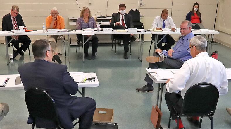 A public hearing was held at the Clark County Board of Elections about a Mad River Twp. referendum challenging the Hillside Farms housing development Thursday. BILL LACKEY/STAFF