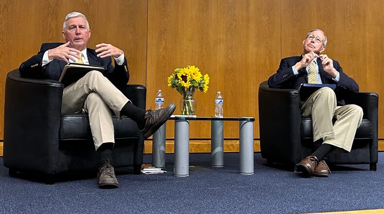 Former Ohio Gov. Bob Taft (right) and former state Rep. Mike Curtin (left) participate in a June forum hosted by the Dayton League of Women Voters centered on the Aug. 8 special election for Issue 1. AVERY KREEMER/STAFF