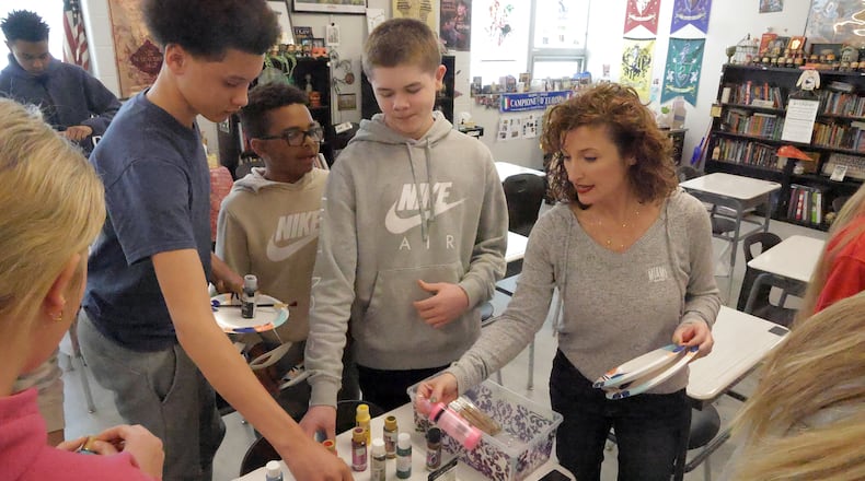 Annette Lloyd works on a project with her class at Shawnee Middle School on Wednesday, March 12, 2025. BILL LACKEY/STAFF