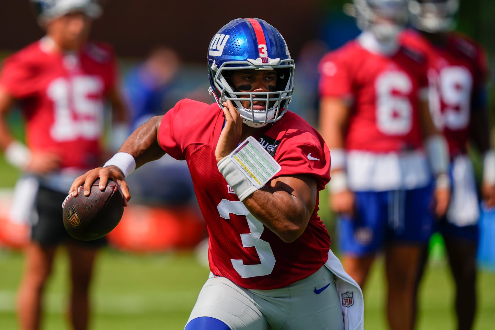 New York Giants quarterback Russell Wilson (3) looks to throw during practice at the team’s NFL football training camp in East Rutherford, N.J., Wednesday, July 23, 2025. (AP Photo/Yuki Iwamura)