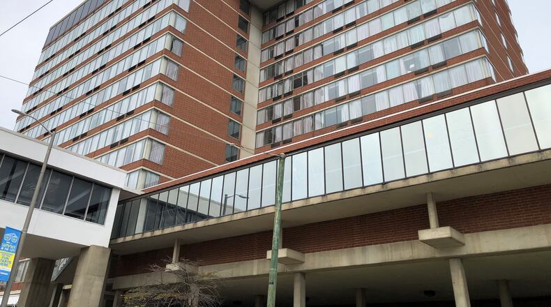 The Radisson Hotel, the former Crowne Plaza, at 33 E. Fifth St., across the street from the Dayton Convention Center. CORNELIUS FROLIK / STAFF