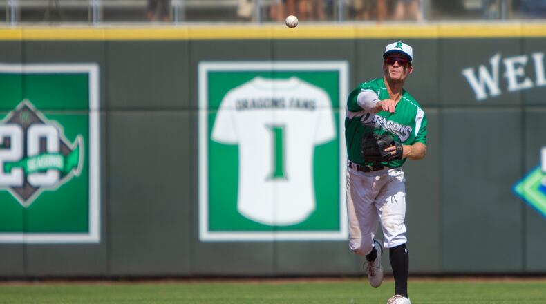 Dragons shortstop Matt McLain throws a runner out at first during Sunday's final game of the season against Fort Wayne at Day Air Ballpark. Jeff Gilbert/CONTRIBUTED