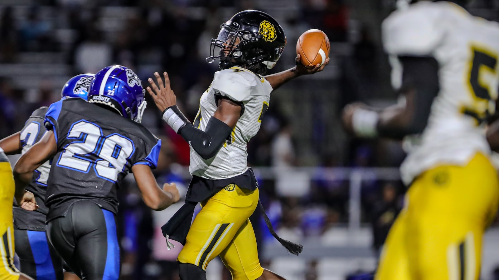 Meadowdale quarterback Jordan Brown throws a pass as they defeated Dunbar, 44-14, in a Dayton City League football game at Welcome Stadium on Thursday, Oct. 3, 2024. Michael Cooper/CONTRIBUTED