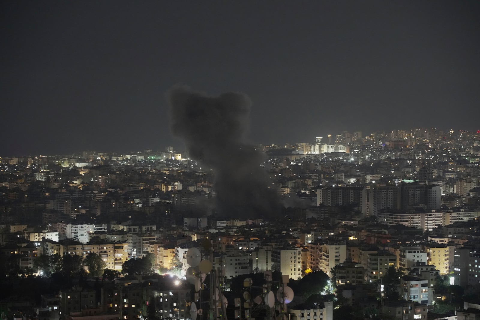 Smoke rises following an Israeli airstrike on Dahiyeh in the southern suburb of Beirut, Lebanon, Thursday, June 5, 2025. (AP Photo/Hassan Ammar)