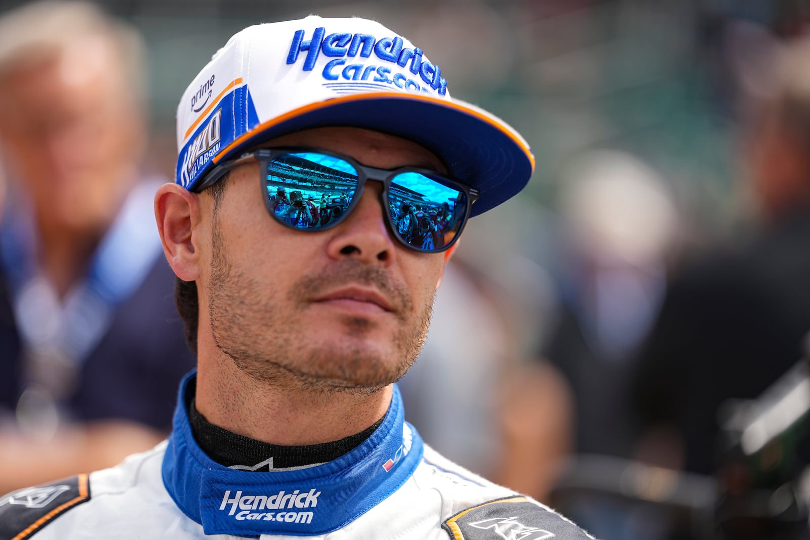 Kyle Larson watches as he waits for is turn during qualification for the Indianapolis 500 auto race at Indianapolis Motor Speedway in Indianapolis, Saturday, May 17, 2025. (AP Photo/Michael Conroy)