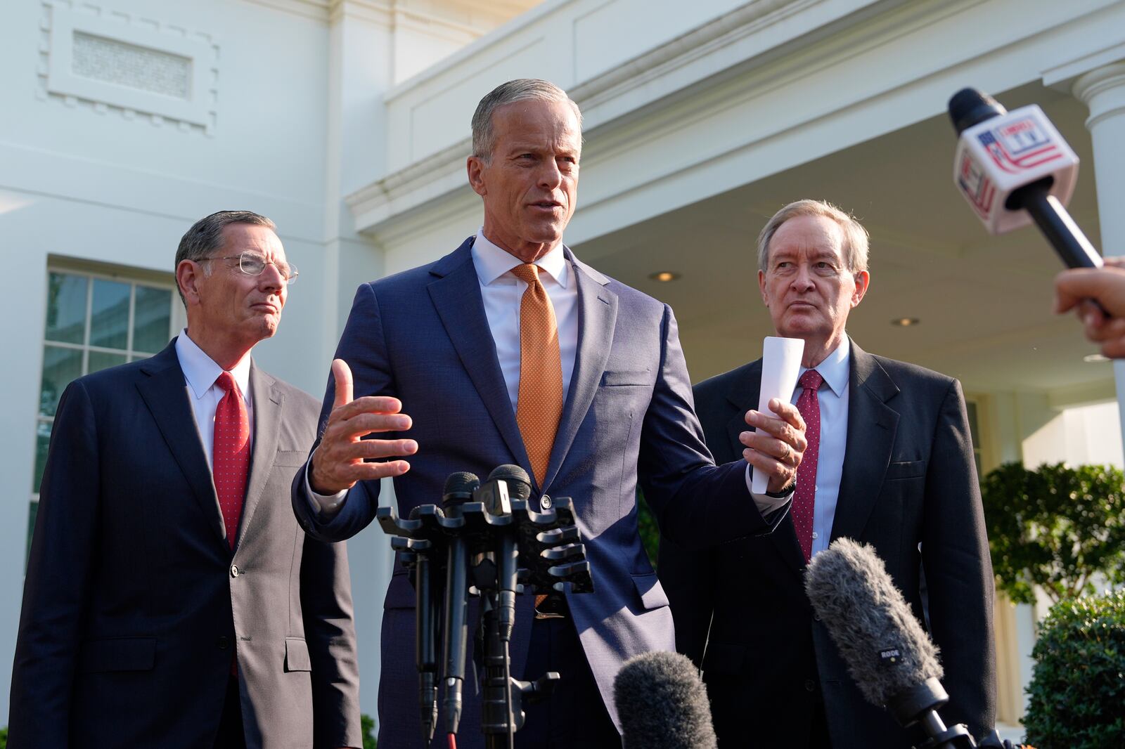 Senate Majority Leader John Thune, R-S.D.,, flanked by Sen. John Barrasso, R-Wyo., left, and Sen. Mike Crapo, R-Idaho, speak with reporters after meeting with President Donald Trump at the White House, Wednesday, June 4, 2025, in Washington. (AP Photo/Alex Brandon)